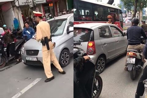 Phạt ít nhất 5 triệu đồng đối với nữ lái xe ủi CSGT đi hàng trăm mét