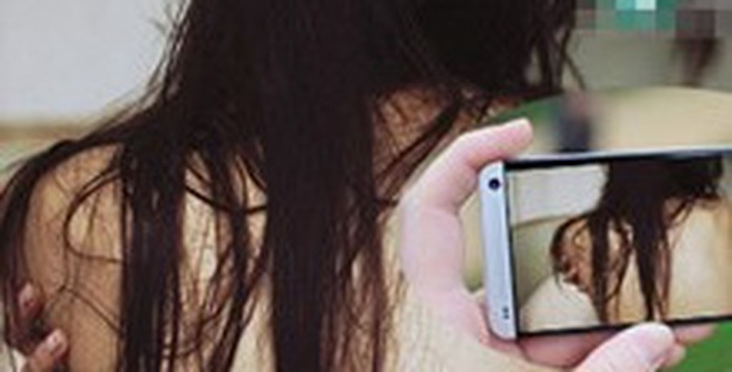 Người đàn ông 50 tuổi tống tiền người tình bằng clip nóng